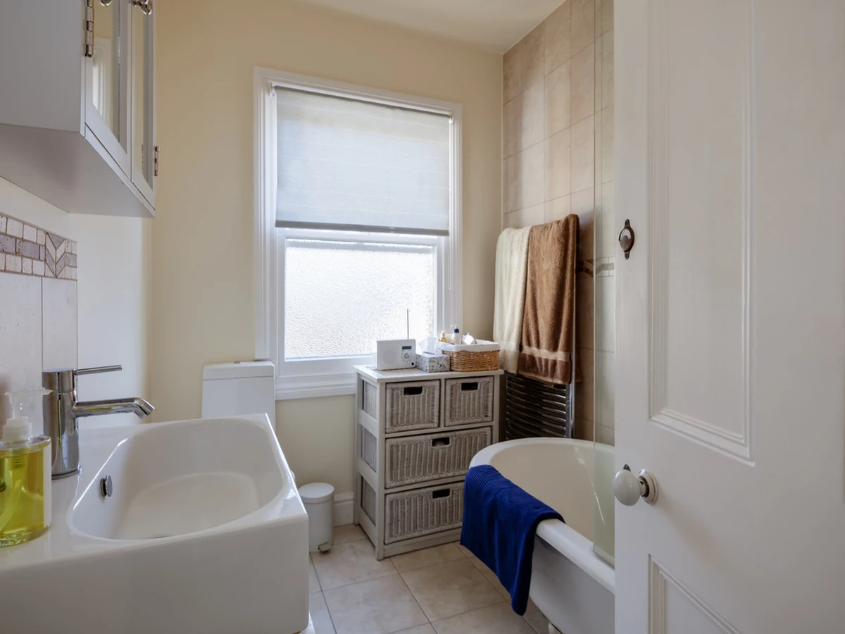 Bathroom painting in a small Victorian bathroom in Bath, freshly painted walls and ceiling