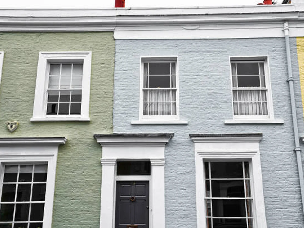 Terraced houses in Bath with freshly painted exterior render