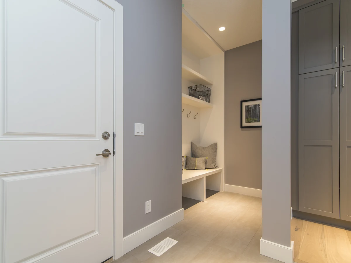 Hallway painting with grey mudroom door in Bath by Bath Decorators