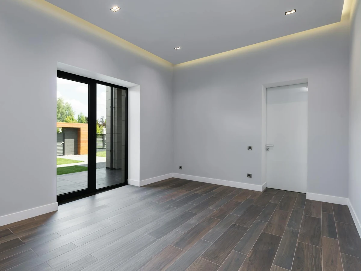 Interior painting in Midsomer Norton, empty room with grey walls by Bath Decorators