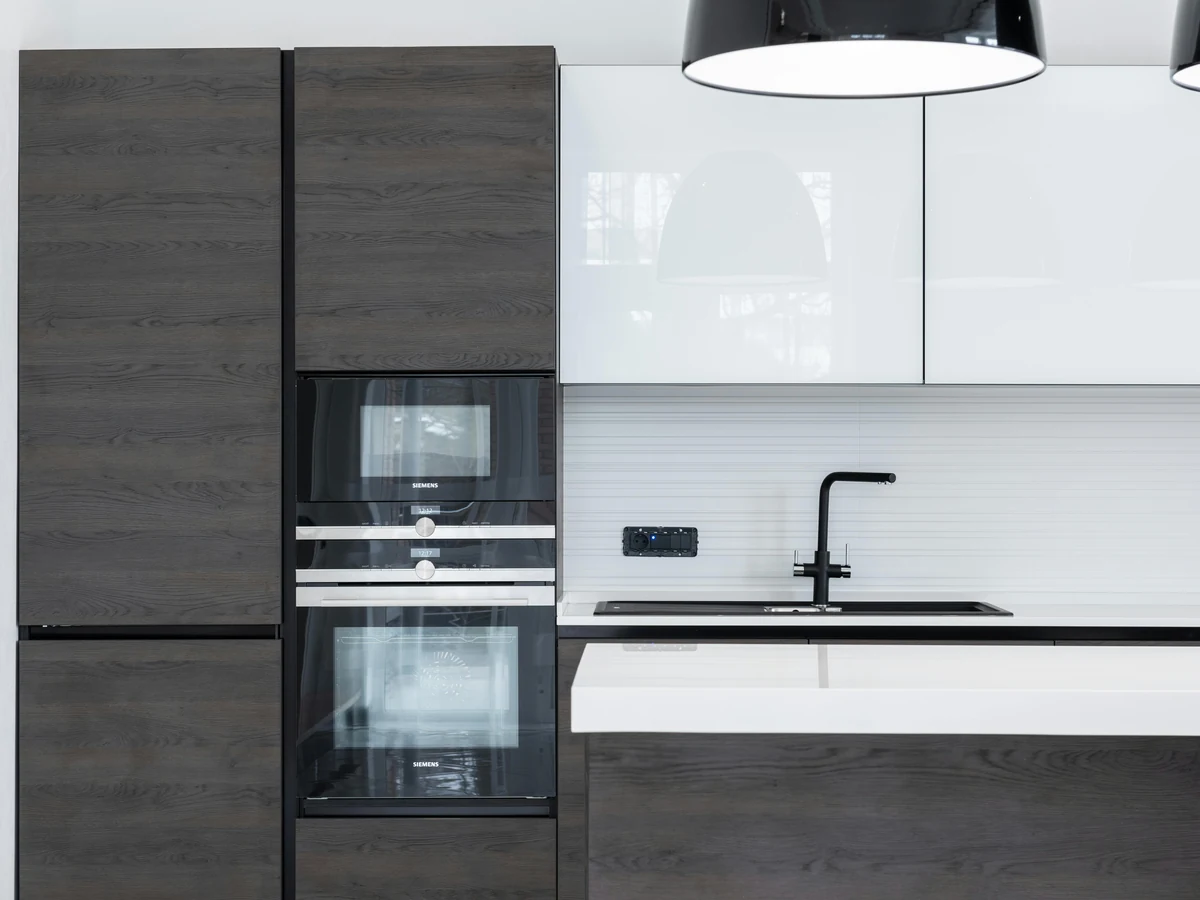 Dark grey wood kitchen cabinet painting in Bath, professional spray finish by Bath Decorators