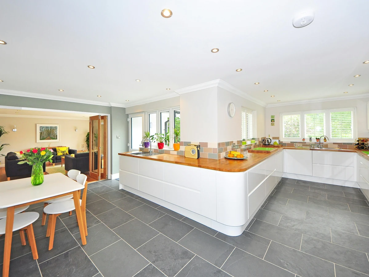 Large open-plan kitchen cabinet painting in Bath, professional finish by Bath Decorators