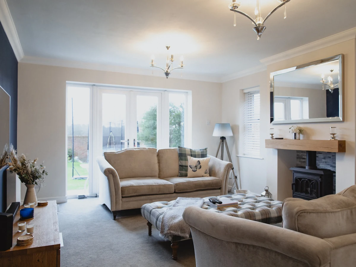 living-room-painting-living-room-blue-bath-decorators Feature wall painting in Bath living room with bold blue accent wall by Bath Decorators