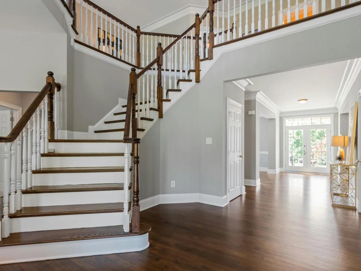 Grand curved staircase painting in Bath by Bath Decorators