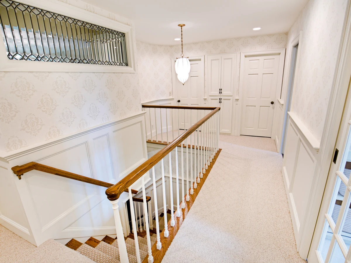 Residential stairwell painted white in Bath by Bath Decorators